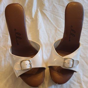 White mule Size 7.5 woodgrain on heel